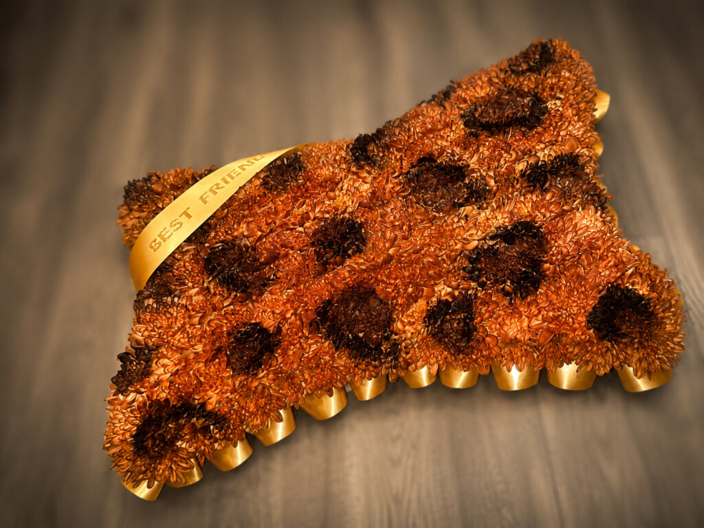 Leopard print personalised funeral tribute, Eastbourne