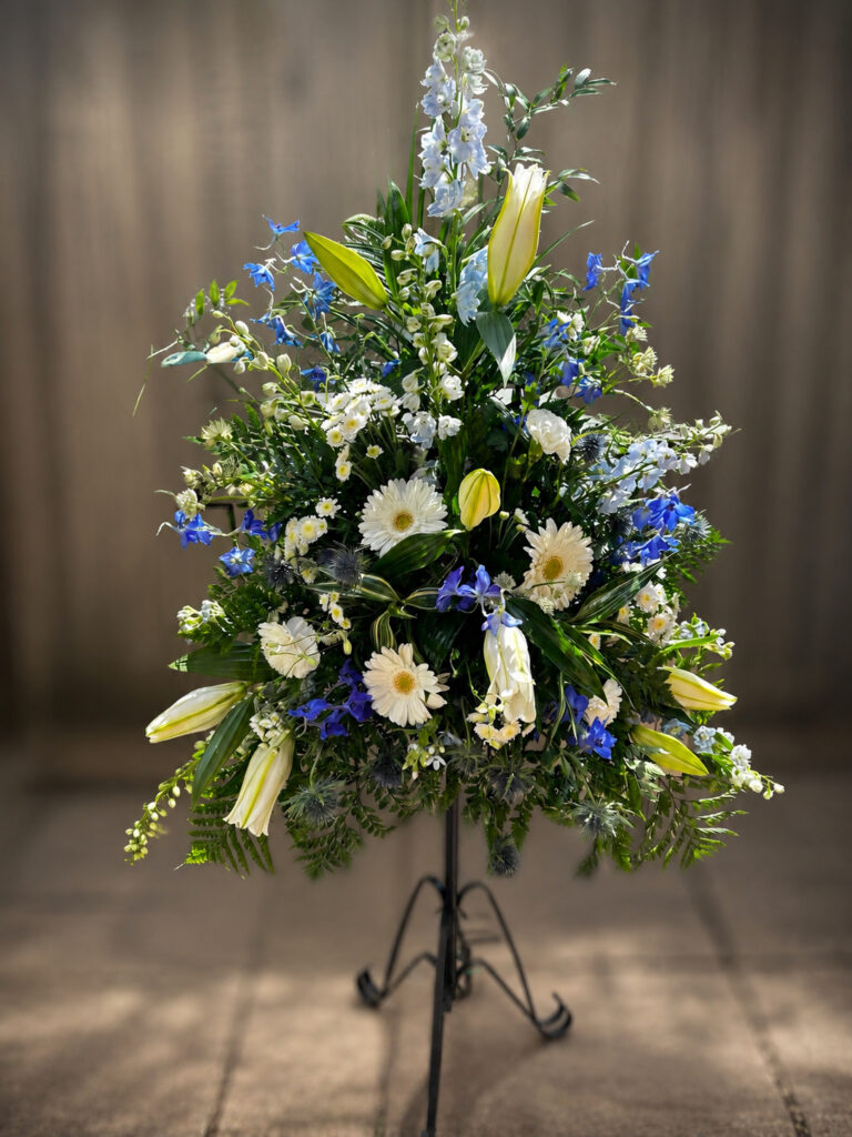 White and blue sympathy flower arrangement, Eastbourne
